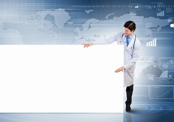 Male doctor with banner — Stock Photo, Image