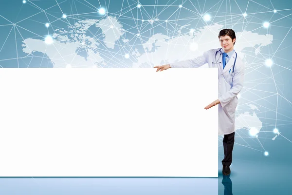 Médico masculino com banner — Fotografia de Stock