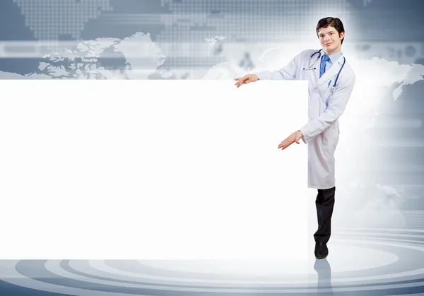 Mężczyzna lekarz z banerem — Zdjęcie stockowe