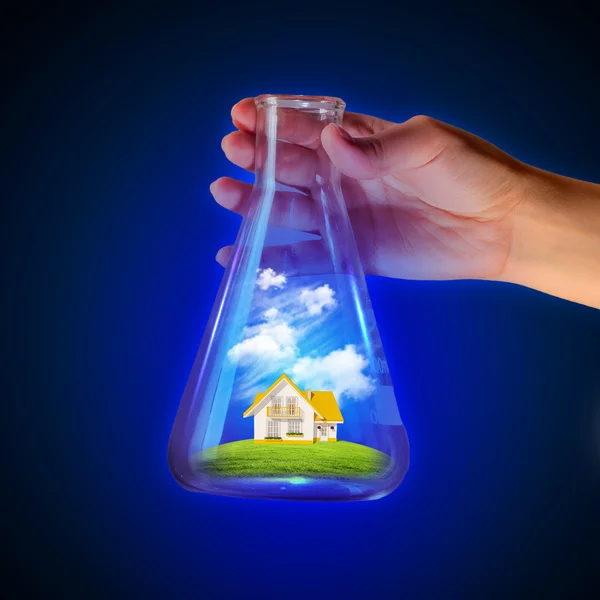 House in test tube — Stock Photo, Image