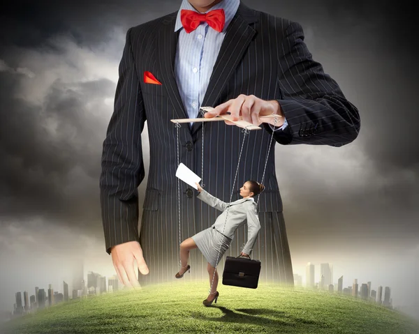 Businessman puppeteer — Stock Photo, Image