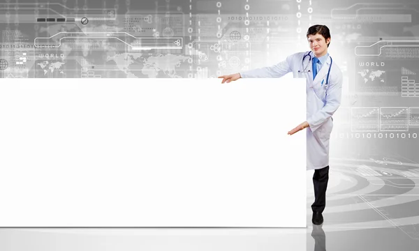 Male doctor with banner — Stock Photo, Image