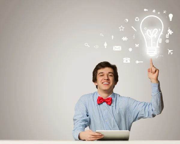 Young man with laptop — Stock Photo, Image