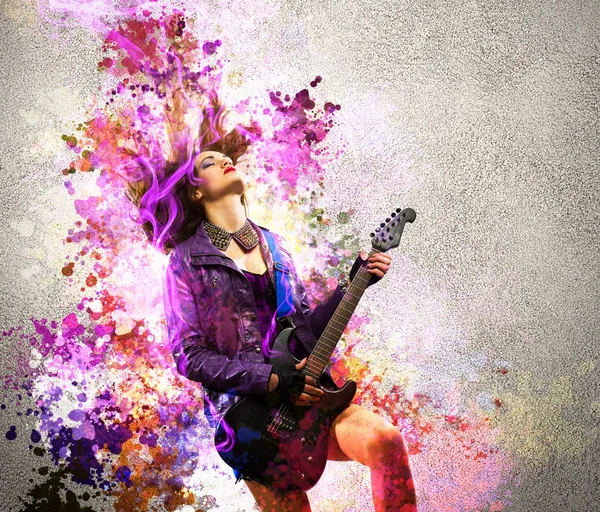 Rock passionate girl with black wings — Stock Photo, Image