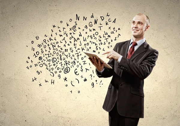 Businessman holding tablet pc — Stok fotoğraf