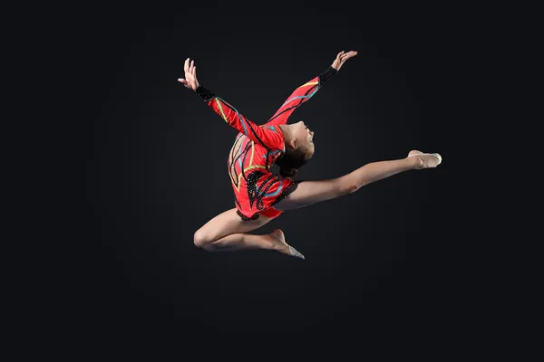 Young woman in gymnast suit posing — Stock Photo, Image