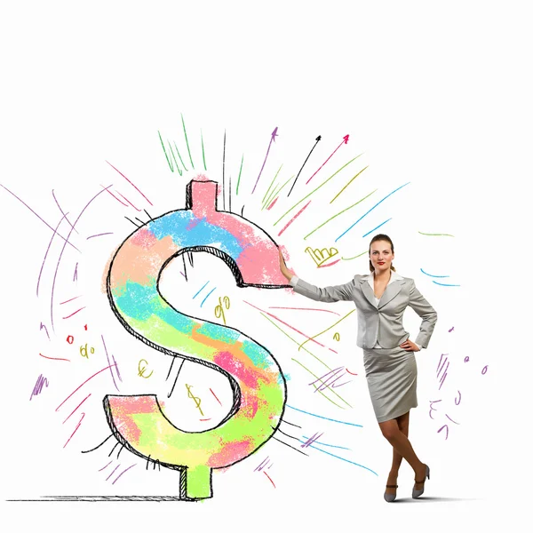 Businesswoman leaning on dollar sign — Stock Photo, Image