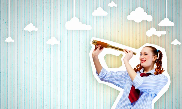 Woman looking in telescope — Stock Photo, Image