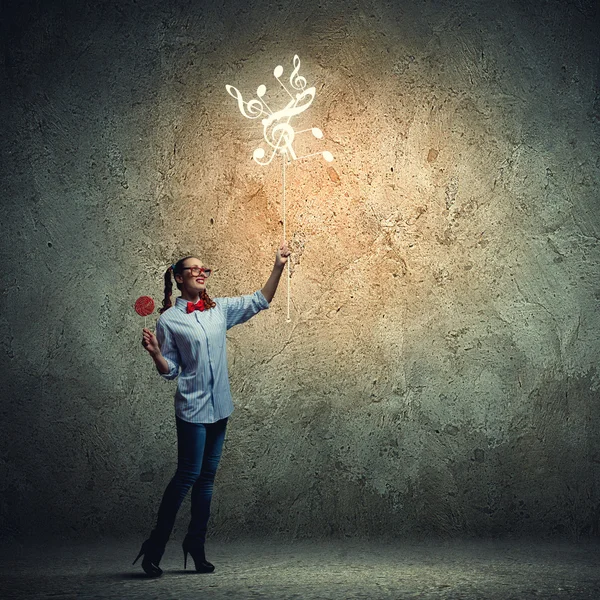 Teenager girl with candy — Stock Photo, Image