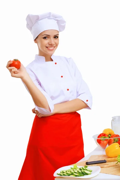 Junge Köchin bereitet Essen zu — Stockfoto