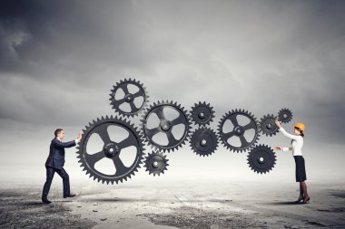 iş insanları ve mekanizma elemanları