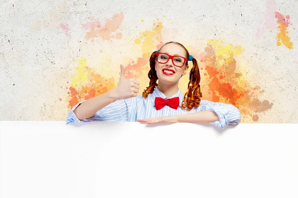 Woman with a blank billboard — Stock Photo, Image