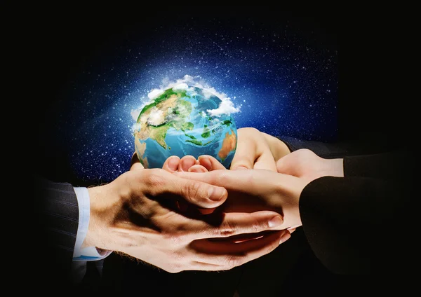 Earth planet in hands — Stock Photo, Image