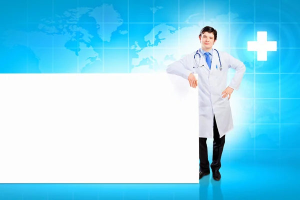 Doctor con banner en blanco — Foto de Stock