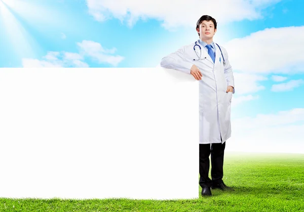 Läkare med Tom banner — Stockfoto