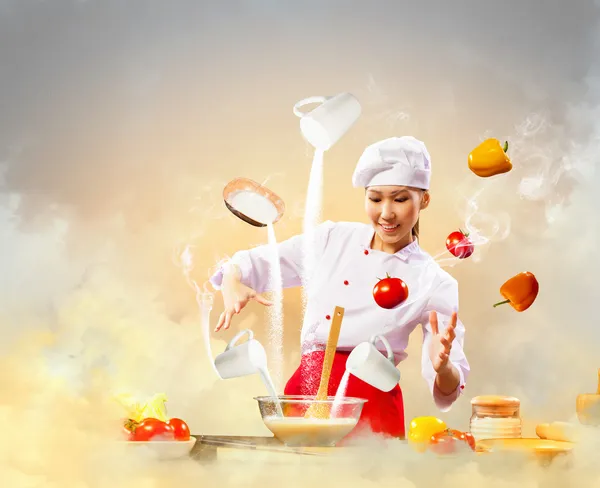 Cocina femenina asiática con magia —  Fotos de Stock