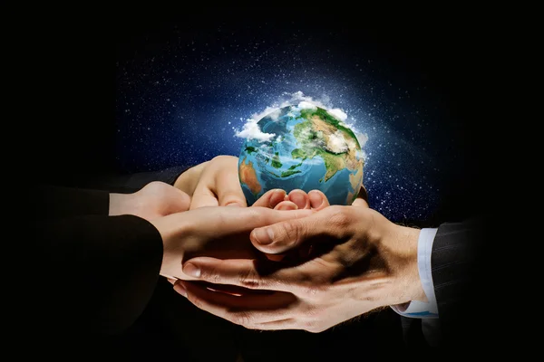 Earth planet in hands — Stock Photo, Image