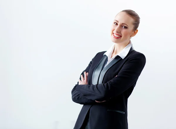 Attraktiv affärskvinna i svart kostym — Stockfoto