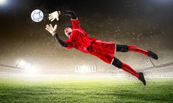 Goalkeeper catches the ball — Stock Photo, Image