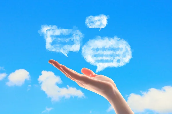 Close up of hand with chat bubbles — Stock Photo, Image