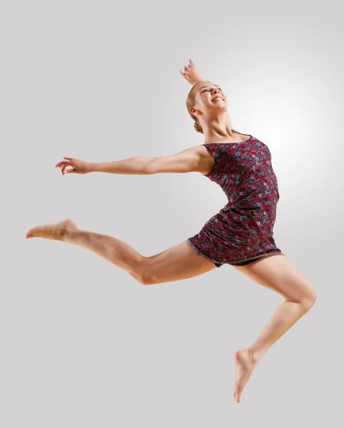 Girl in color dress dancing — Stock Photo, Image