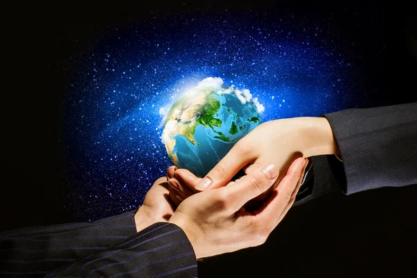 Earth planet in hands — Stock Photo, Image