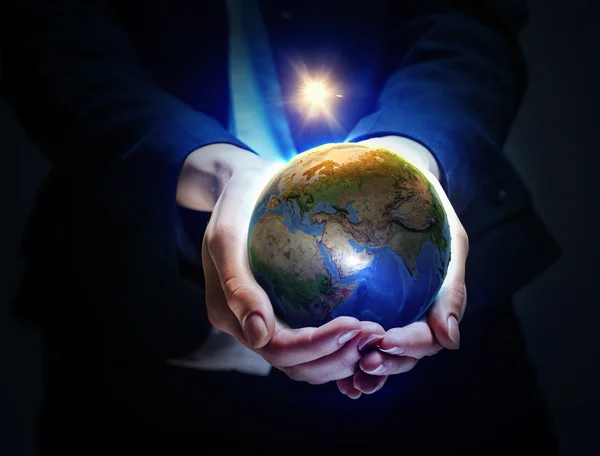 Earth planet in hands — Stock Photo, Image