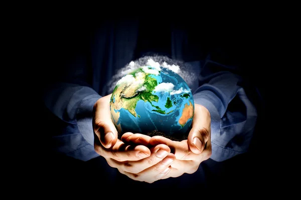 Earth planet in hands — Stock Photo, Image