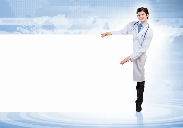 Mannelijke arts met banner — Stockfoto