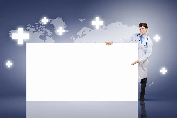 Male doctor with banner — Stock Photo, Image