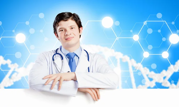 Doctor with blank banner — Stock Photo, Image