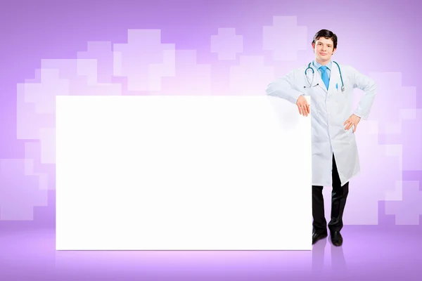 Manliga läkare med banner — Stockfoto