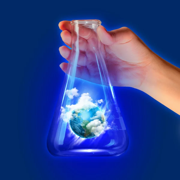 Globe in test tube — Stock Photo, Image