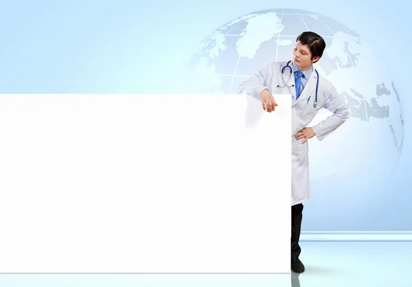 Male doctor with banner — Stock Photo, Image