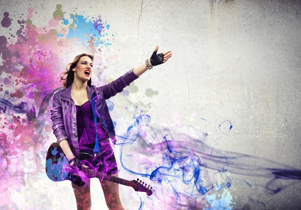 Rock passionate girl with black wings — Stock Photo, Image