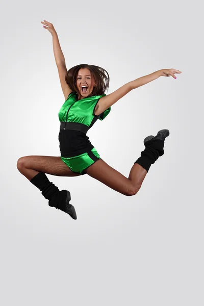 Young female dancer against white background — Stock Photo, Image