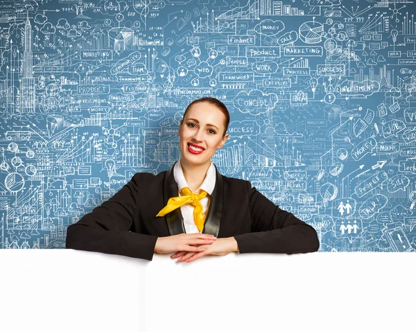 Businesswoman with blank banner — Stock Photo, Image