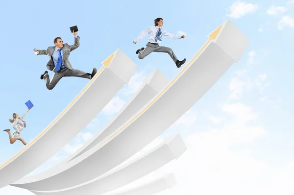 Empresários saltando — Fotografia de Stock