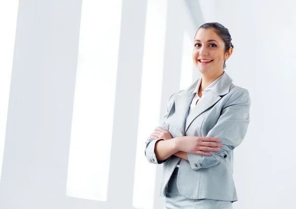 Attractive asian businesswoman in grey suit — Stock Photo, Image