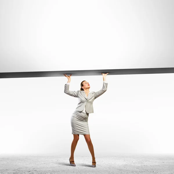 Businesswoman with banner — Stock Photo, Image