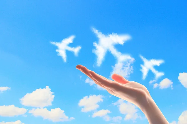 Közelkép a kezét a repülőgépek szimbólumokkal — Stock Fotó