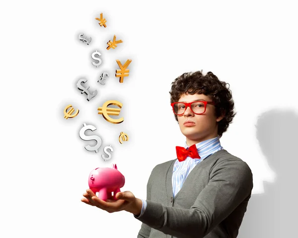 Jonge zakenman bedrijf moneybox — Stockfoto