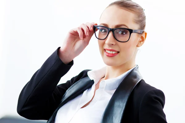 Attractive businesswoman in black suit — Stock Photo, Image