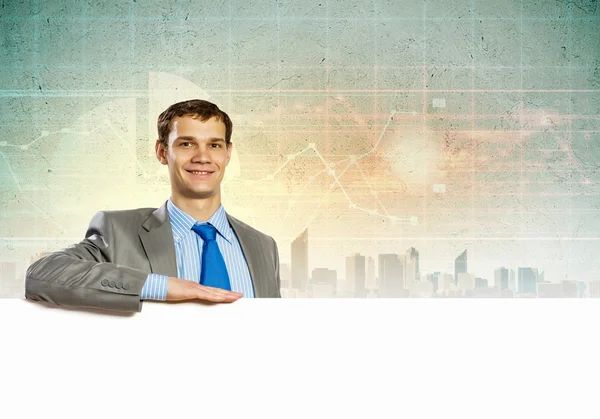 Businessman with blank banner — Stock Photo, Image