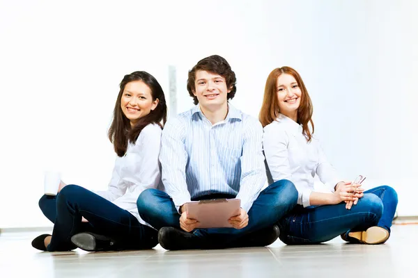 Three students smiling — Stockfoto