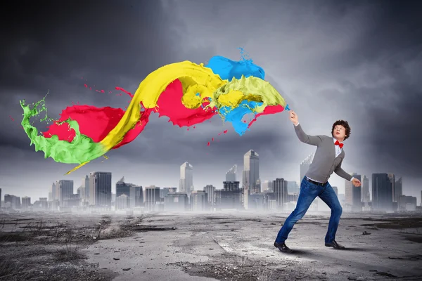 Young man and colour splash — Stock Photo, Image