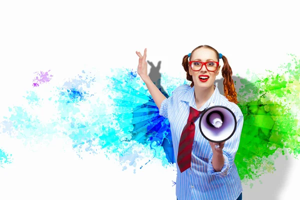 Funny looking woman with megaphone — Stock Photo, Image