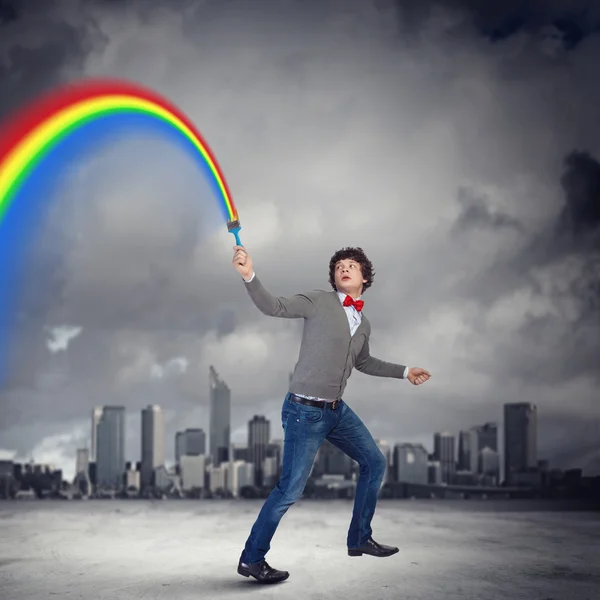 Young man and colour splash — Stock Photo, Image