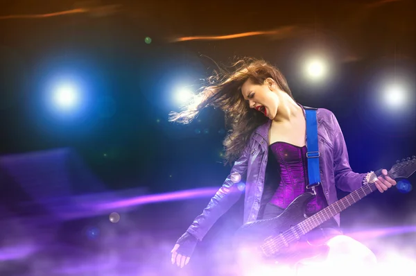 Rock passionate girl with black wings — Stock Photo, Image