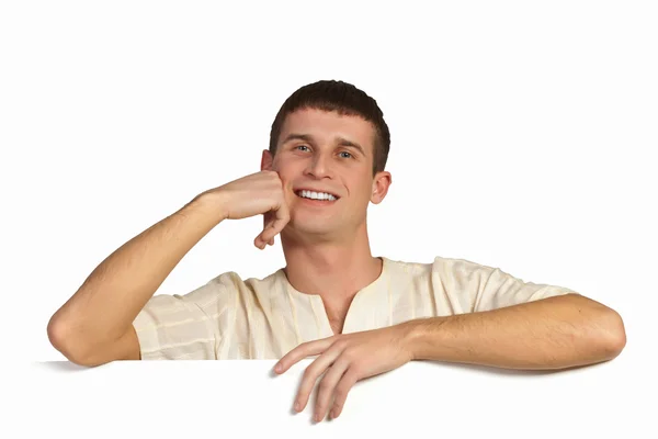 Boy with a blank billboard — Stock Photo, Image